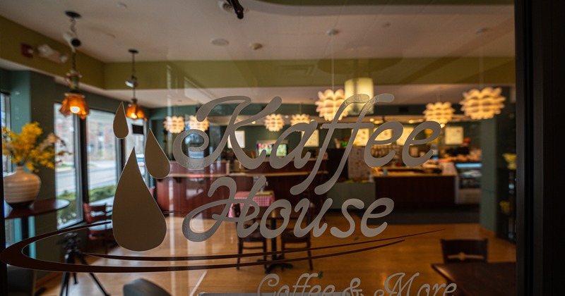 Interior, look true glass entrance with sign