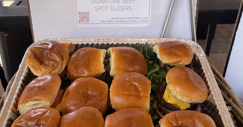 Cheeseburger sliders in a catering tray