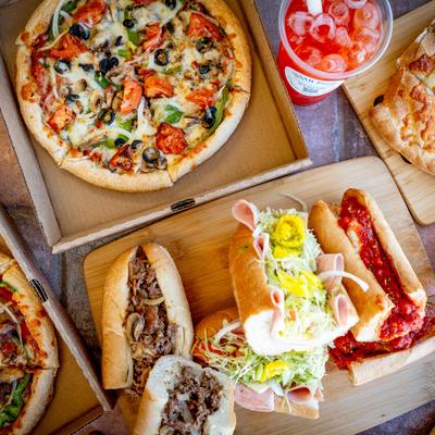 Assortment of dishes from Zesto Pizza.
