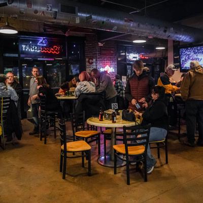 Interior, a Crowd of guests sitting at Foodstage