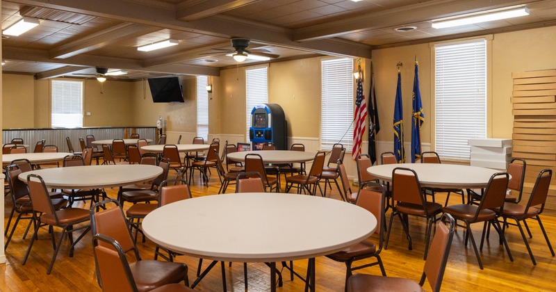 Interior, seating area with big round tables
