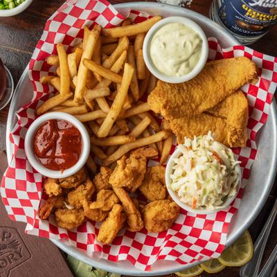 Fried fish and shrimp, served with fries, coleslaw, and dipping sauces.