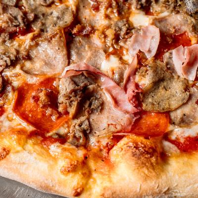 Meat Lovers Pizza, closeup.