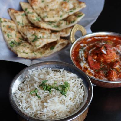 Butter Chicken w/Garlic Naan and Basmati Rice.
