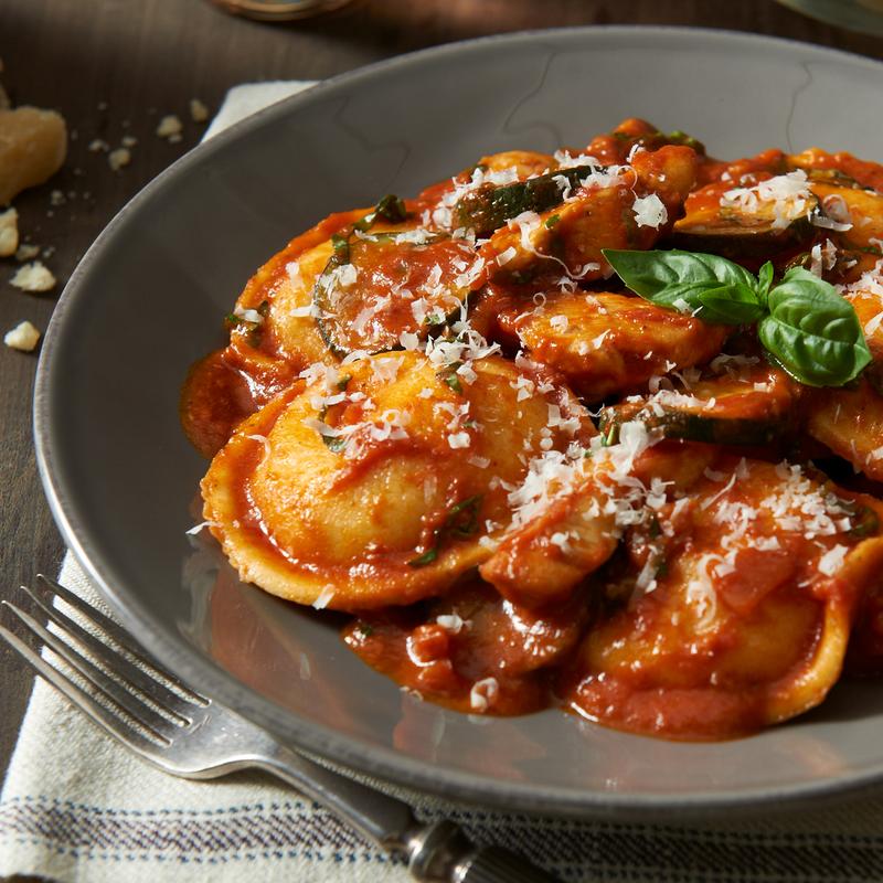 Home Made Ravioli porcini and pomodoro photo