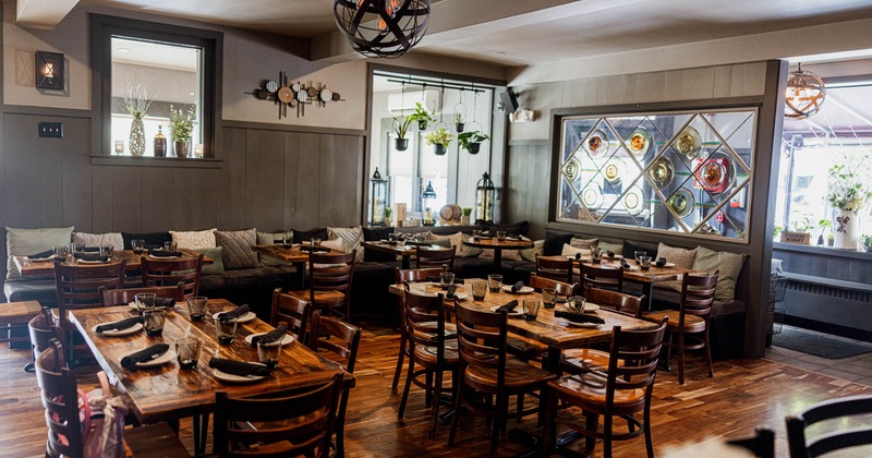 Interior, dining area, tables ready for guests