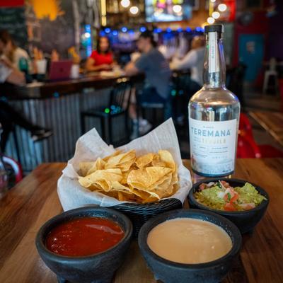 Tortilla chips and dipping sauces.