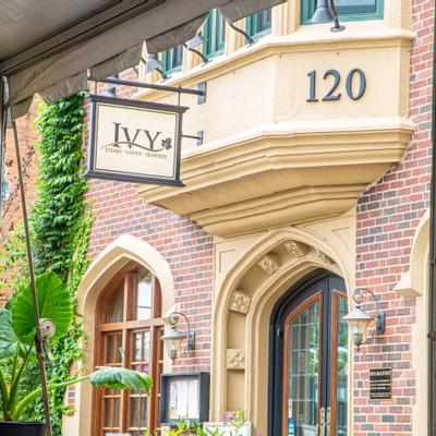 Restaurant exterior, front entrance and sign above the front door