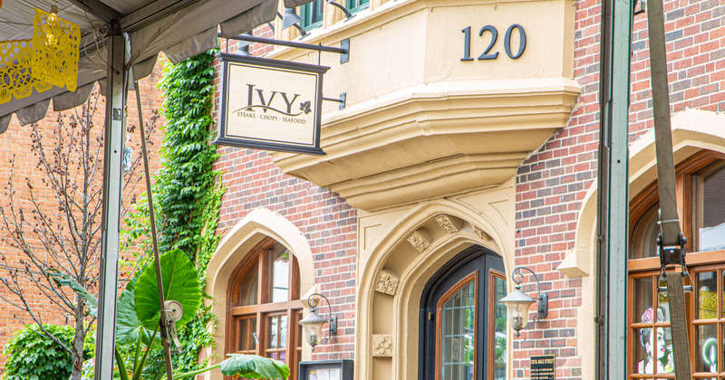 Exterior, restaurant front entrance and sign above the front door