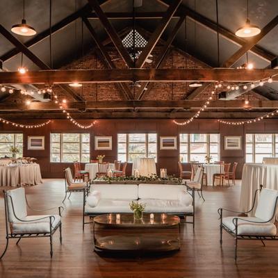White chairs, sofa, and a coffee table.