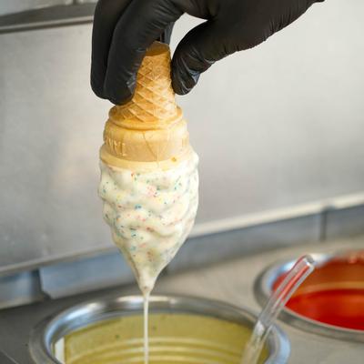 Small vanilla ice cream cone.