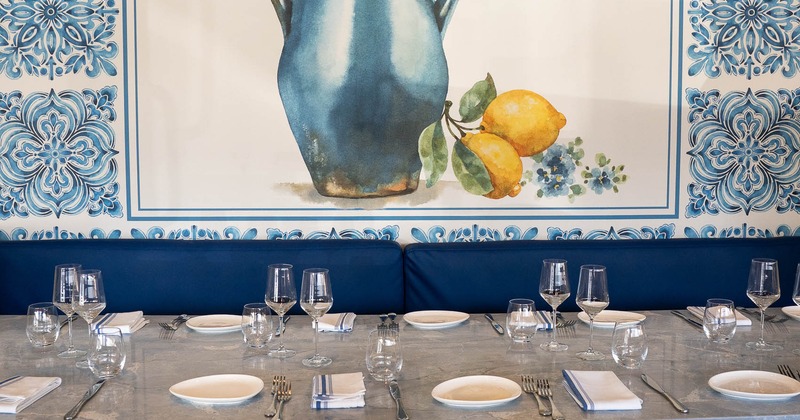 Interior, tables with plates, tableware and glasses