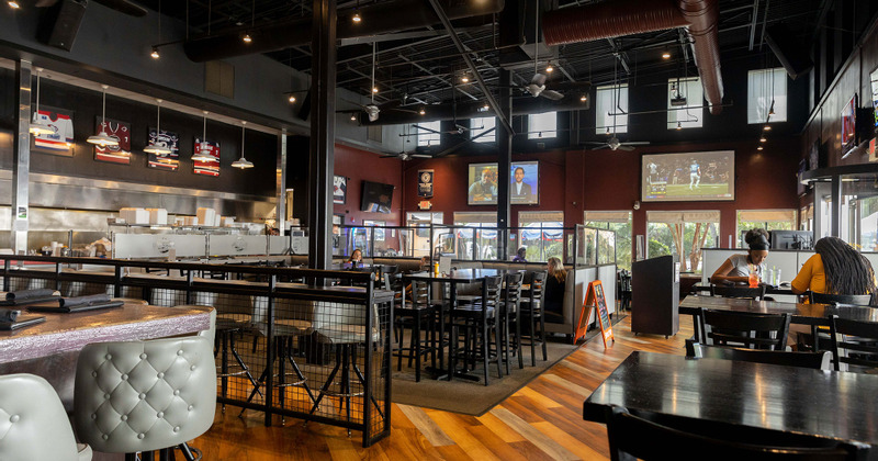 Interior shot of king street grille in mount pleasant with a variety of seating options