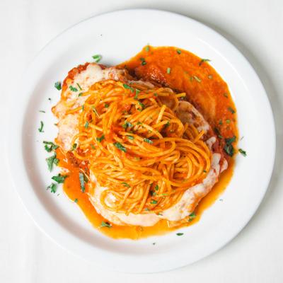 Served pollo parmigiana in the plate.