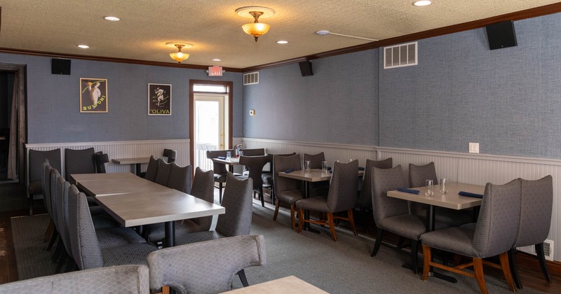 View of a dining space, tables and chairs