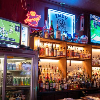 Bottles on shelves and in the frige