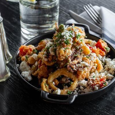 Served calamari on the table.