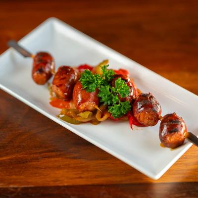 Grilled sausages with smoked paprika.