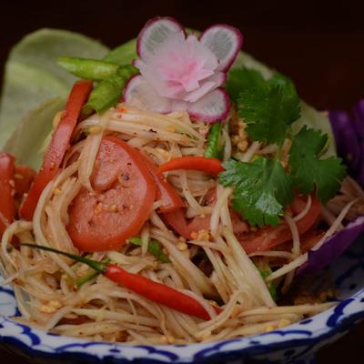 Thai salad with fresh sprouts, lettuce, cilantro and vegetables.