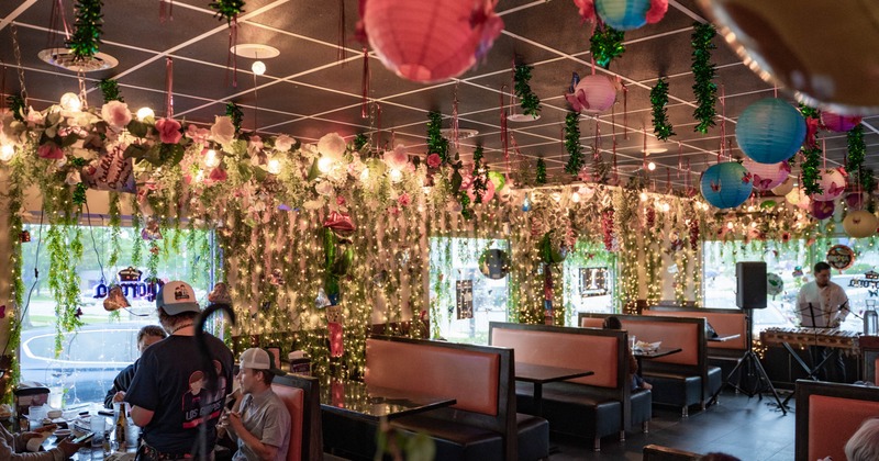 Interior, main dining area with guests