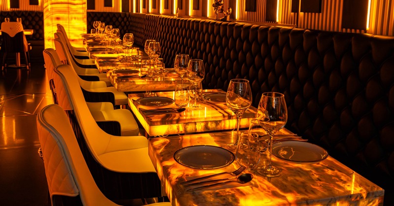 Inside, seating area with tables and chairs