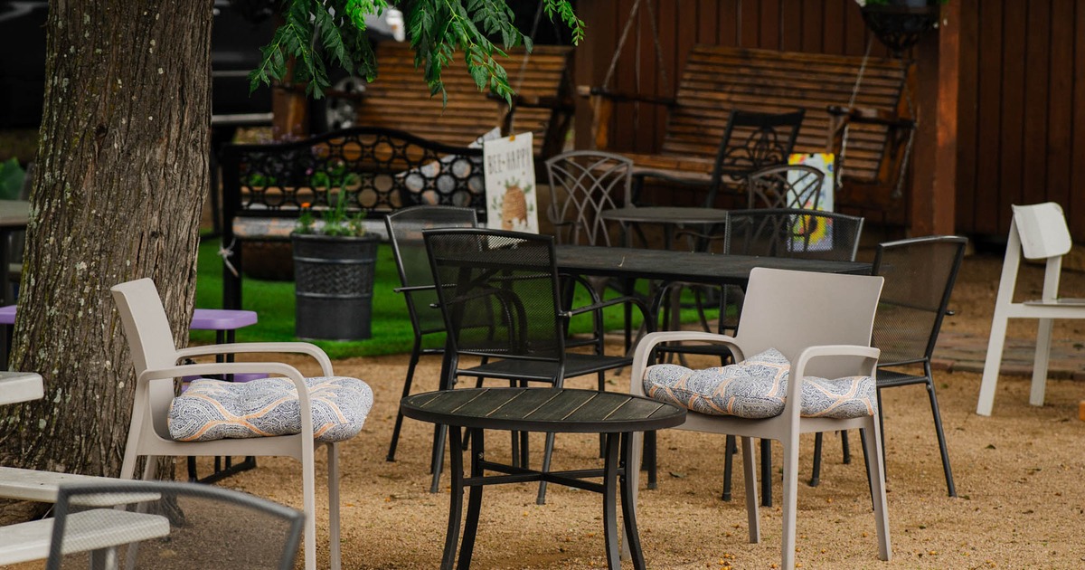 Outside, dining tables and chairs