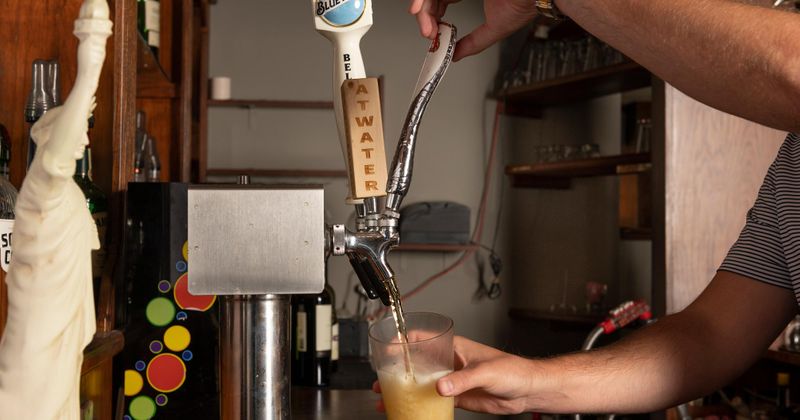 Pouring beer from a tap