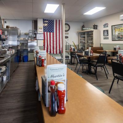 Dining area with an American flag on the counter.