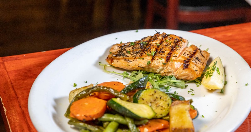 Grilled salmon, served with grilled vegetables