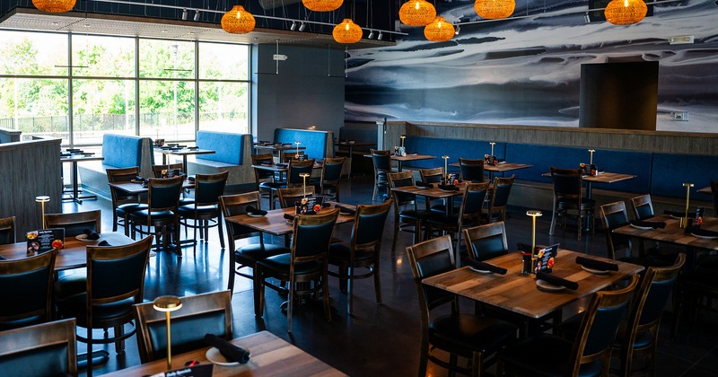 Restaurant interior, dining area with set tables