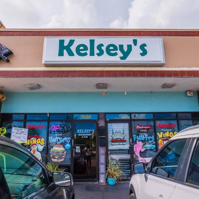 Kelsey’s Bar and Grill storefront with signage.