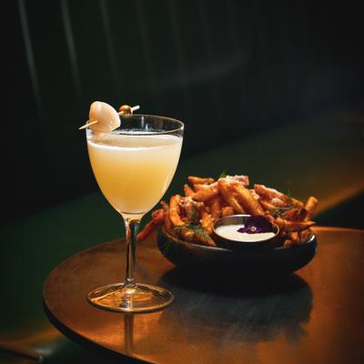 Lychee Martini and seasoned fries.