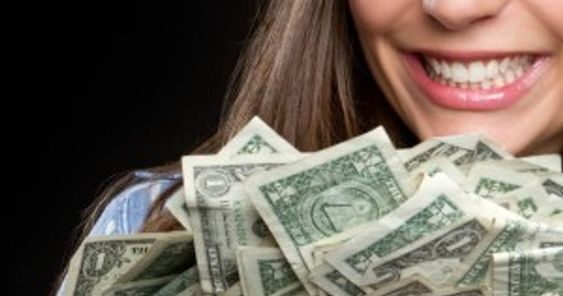 A pile of single dollar bills