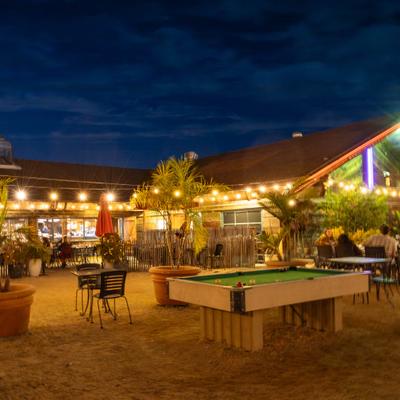 Outdoor patio with a pool table.