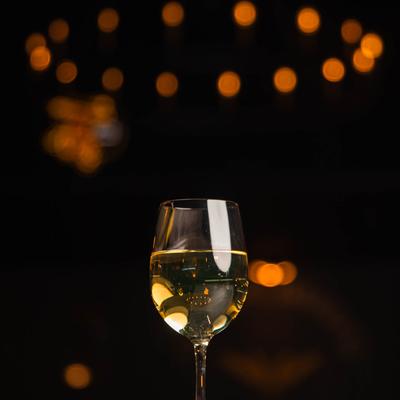 A glass of white wine.