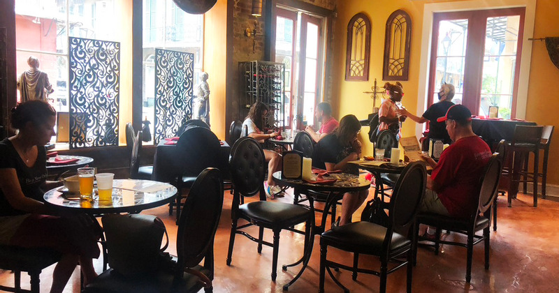 Interior, guests enjoying food and drinks