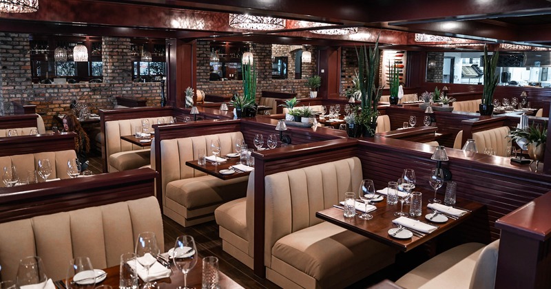 Booth seating area, tables ready for guests