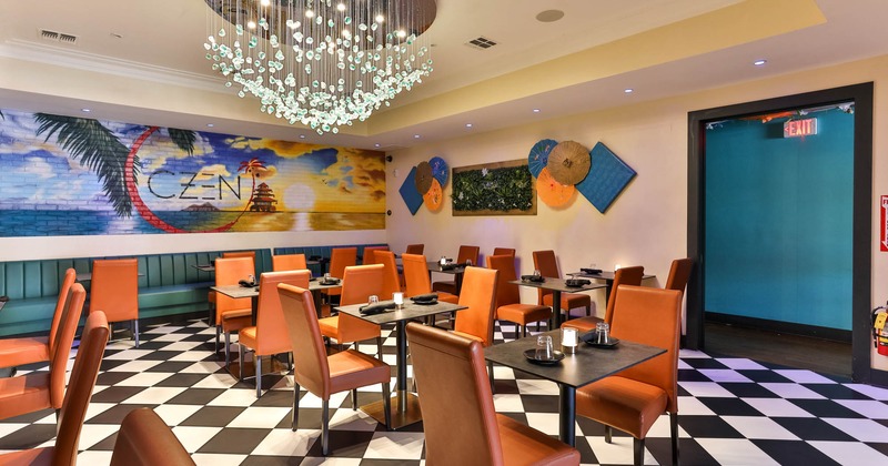 Interior, tables and brown leather chairs