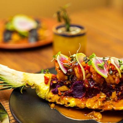 A served meal and a drink.