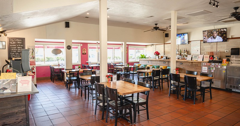 Interior, dining area with TVs
