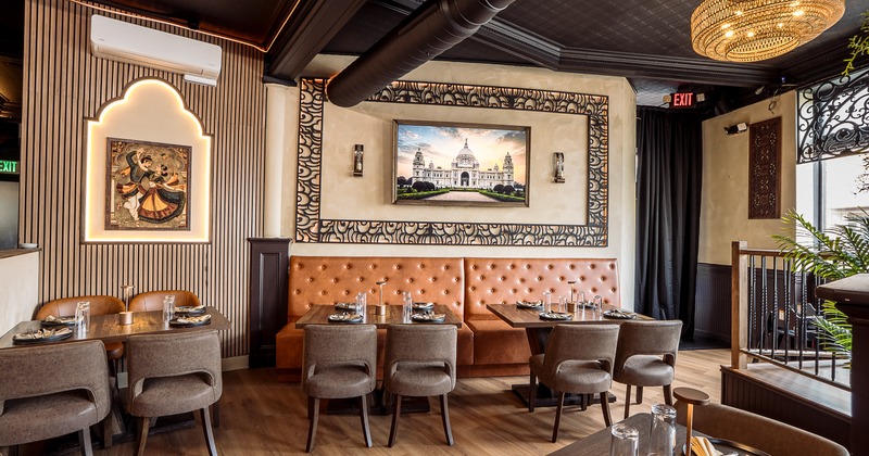 Modern and cozy interior dining area with set dining tables