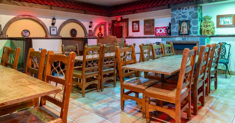 Interior, seating area with wooden tables and chairs