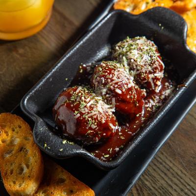 3 slow smoked meatballs with a Jack Daniel's BBQ sauce with Texas toast