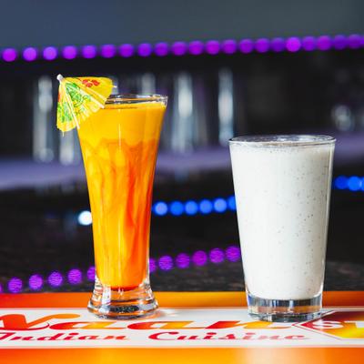 Mango Lassi and Classic Sweet Lassi on a barcounter.