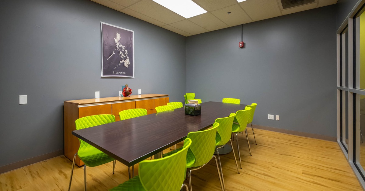 Table and green chairs