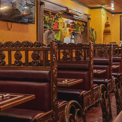 Classic Mexican restaurant interior, dining booths.