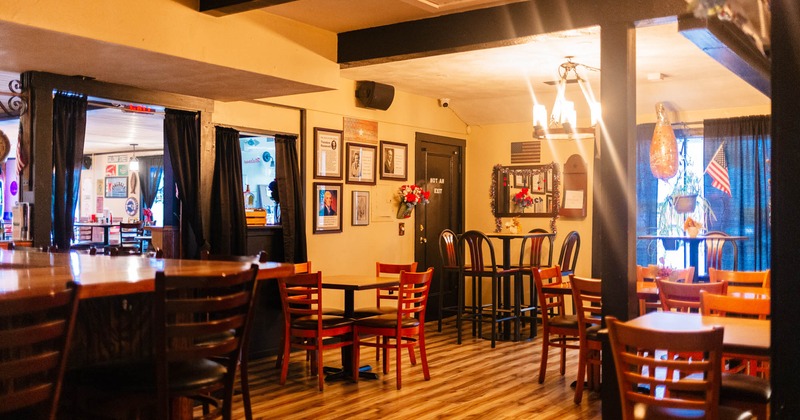Inside, seating area with tables and chairs