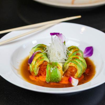 Spicy tuna rolls wrapped in avocado.