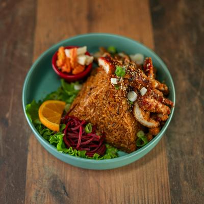 Volcano fried rice with fried chicken.