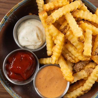 French Fries, with dipping sauces.